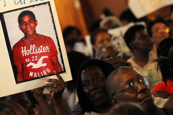 Civil rights leaders and residents of the city of Sanford attend to a town hall meeting to discuss the death of an unarmed black teen Trayvon Martin