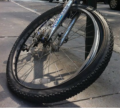 A big wheel, deceptively unrideable in Midtown.