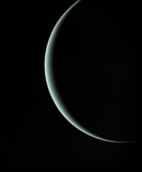 Farewell shot of crescent Uranus as Voyager 2 departs. January 25, 1986. Range 600,000 miles. 