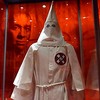 This February 25, 2011 video image shows the image of an African American man behind a Ku Klux Klan (KKK) robe on exibit as part of the 'American I AM: The African Imprint' at the National Geographic 