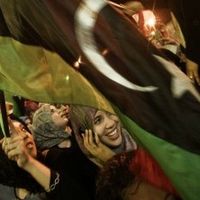 Libyan women shout anti-Gadhafi slogans at Freedom Square on August 22, 2011 in Benghazi, Libya.