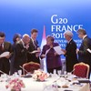 German Chancellor Angela Merkel, European Comission President Jose Manuel Barroso, and IWF Chief Christine Lagarde after a meeting with Greek Prime Minister George Papandreou over a euro zone bailout.