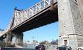The outdoor exhibit sits under the Ed Koch Queensboro Bridge, at the junction of Vernon Boulevard and South Queens Plaza.