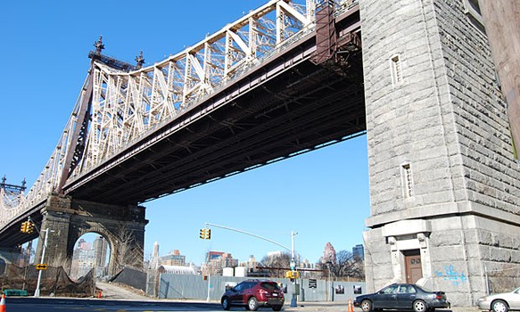 The outdoor exhibit sits under the Ed Koch Queensboro Bridge, at the junction of Vernon Boulevard and South Queens Plaza.