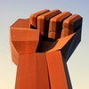 fist statue obelisk