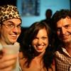 friends laughing at a bar