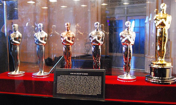 One of the displays also includes the statuettes in various stages of completion, as manufactured by R.S. Owens & Company in Chicago.
