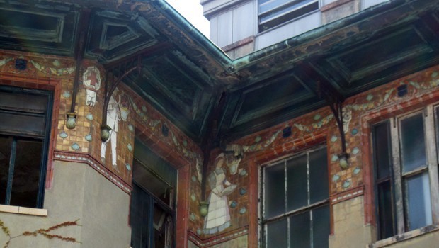 Detail of some of the Delft tile work underneath the eaves of a pavilion