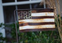 rusty American flag, poverty