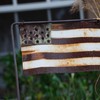rusty American flag, poverty