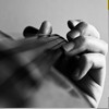 Playing the violin.
