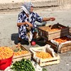 A fruit seller at market in Uzbekistan