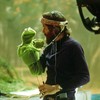 Puppet master Jim Henson with his alter-ego, Kermit — on view at the Museum of the Moving Image.