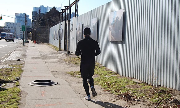 A runner passes by the show.