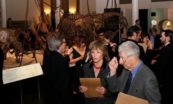 Guests try to work their way through Stephen Sondheim's treasure hunt at the Natural History Museum.