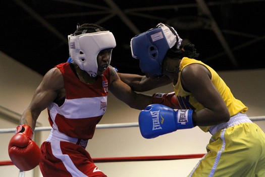 Tyrieshia fighting at the Police Athletic League Tournament in Toledo, OH in October, 2011.  “Just because I have on a glove doesn’t mean I can’t switch in a second to be a lady.” 