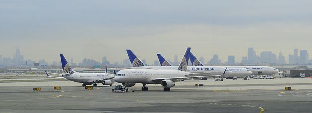 This November 24, 2009 photo shows Continental Airlines jets on the tarmac at Liberty International Airport in Newark, New Jersey. THe New York City skyline is in the background.