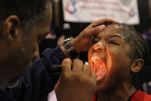 Boxers are examined by a ringside physician after each fight. 