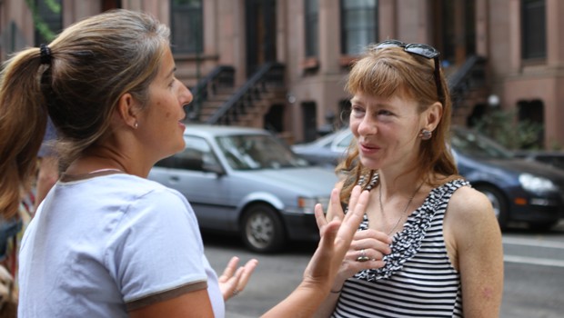 Amy Bender and Rachel Shulder discuss the first day of high school for their daughters.