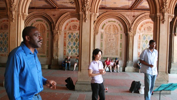 John Boyd, singer, performing in the Bethesda Arcade despite the new regulations that prohibit playing music there.
