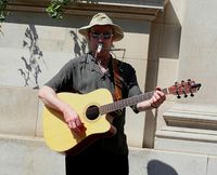 street busker guitar kazoo