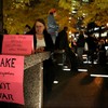 Members of Code Pink set up a table soon after returning to Zuccotti Park.