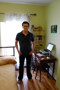 Kelly Sutton in front of some of his remaining possessions
