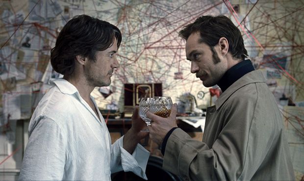 Robert Downey Jr. as Sherlock Holmes and Jude Law as Dr. James Watson in Sherlock Holmes: A Game of Shadows