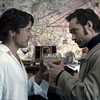 Robert Downey Jr. as Sherlock Holmes and Jude Law as Dr. James Watson in Sherlock Holmes: A Game of Shadows