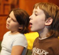 Children from the East Vilage Community School recording.