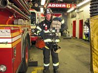 Firefighter Shane Clarke wearing almost 130 pounds of gear.