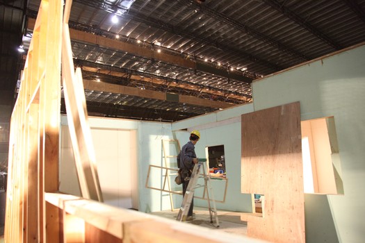 A member of Nara's collaboration team, YNG, in the house-like structure that's part of the upcoming Asia Society show.