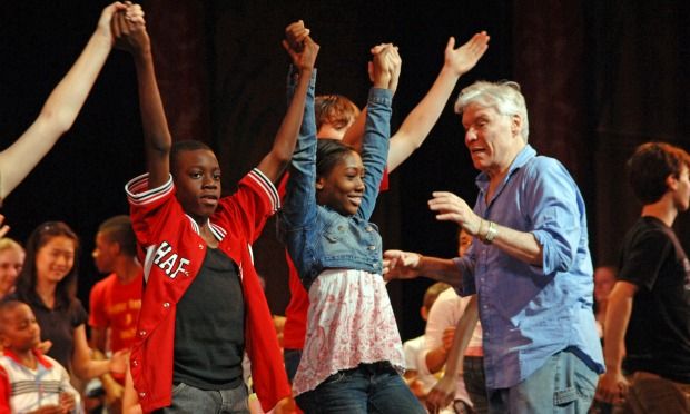 National Dance Institute founder Jacques d'Amboise with young dancers.