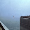 Philippe Petit walks between the two towers of the World Trade Center in 1974.