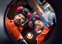 Bryan Cranston (left) as Walter White, a meth-cooking high school chemistry teacher terminal lung cancer, alongside his former student Jesse Pinkman (Aaron Paul, right).