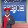 Kermit Ruffins outside his bar, Sidney’s Saloon.