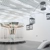 Carsten Höller's Mirror Carousel (left), Singing Canaries Mobile (top right), and Untitled (Slide) (bottom right) at the New Museum