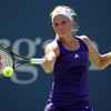 Melanie Oudin of the United States returns a forehand against Olga Savchuk of the Ukraine during her first round women's single match on day one of the 2010 U.S.