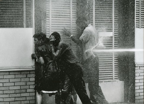 Photojournalist Charles Moore gets a comprehensive survey of his work at Steven Kasher Gallery. Above, the Birmingham Fire Department turns the high pressure hoses on civil rights protestors, 1963.