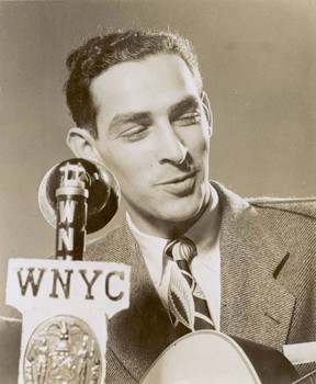 Oscar Brand posing for the press