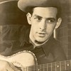 Oscar Brand with his guitar