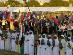 UAE delegates stand in foreground during the parade of nations at the Third International Festival of Falconry held in the United Arab Emirates last December.