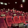 There's no free dishware, but Nighthawk Cinema features dinner and a movie all under the same roof.