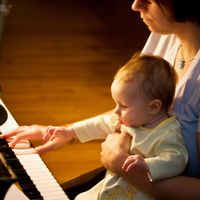 piano lesson: mother and child