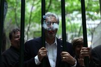Bill Paley, the son of William Paley, now runs the luxury La Palina Cigars brand, smoking in Paley Park on the 44th anniversary of his family's park.