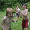 boys having a water balloon fight