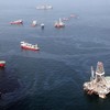 JULY 18: Oil sheen is seen with vessels assisting near the source of the BP Deepwater Horizon oil spill on July 18, 2010 in the Gulf of Mexico off the coast of Louisiana. 