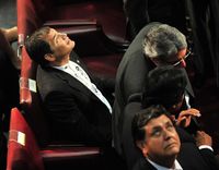 Presidents Rafael Correa of Ecuador (L) and Alan Garcia of Peru (foreground), look at the ceiling of the Congress, as a powerful 7.2 magnitude earthquake rocks central Chile, during the inauguration c