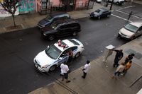 Police officers respond to a tenant harassment complaint at 3/4 house on Miller Avenue in Brooklyn.