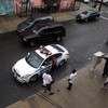 Police officers respond to a tenant harassment complaint at 3/4 house on Miller Avenue in Brooklyn.